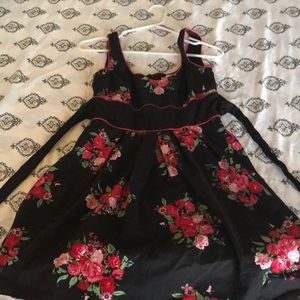 Little black dress with red rose pattern